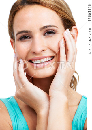 Portrait, woman and touch face for beauty, aesthetic glow and cosmetic dermatology on white background in studio. Happy model, facial skincare and makeup for shine, confidence and wellness results Portrait, woman and touch face for beauty, aesthetic glow and cosmetic dermatology on white background in studio. Happy model, facial skincare and makeup for shine, confidence and wellness results 138605346