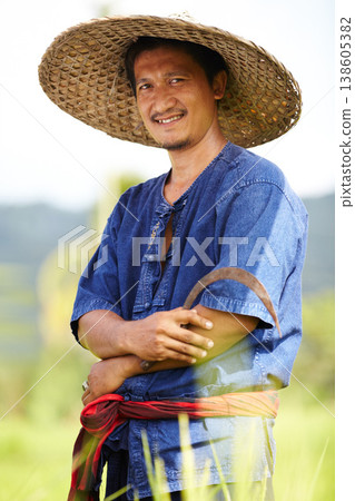 Asian man, portrait and straw hat in farming, wheat or agriculture on rice field in outdoor nature. Happy male person or Thai smile on farm in plantation, gathering or natural sustainability on land Asian man, portrait and straw hat in farming, wheat or agriculture on rice field in outdoor nature. Happy male person or Thai smile on farm in plantation, gathering or natural sustainability on land 138605382