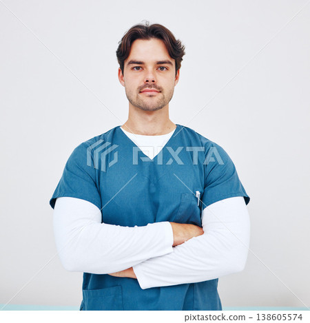 Nurse, portrait and man with arms crossed for healthcare in studio on white background or mock up space. Medicine, doctor and professional employee with serious face for service, trust and career Nurse, portrait and man with arms crossed for healthcare in studio on white background or mock up space. Medicine, doctor and professional employee with serious face for service, trust and career 138605574