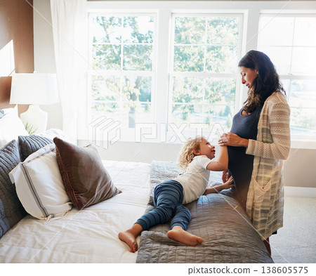 Happy family bedroom, woman pregnancy or child touch stomach to check fetus, moving tummy or prenatal abdomen. Youth kid, pregnant mother and curious for baby fertility development on apartment bed Happy family bedroom, woman pregnancy or child touch stomach to check fetus, moving tummy or prenatal abdomen. Youth kid, pregnant mother and curious for baby fertility development on apartment bed 138605575