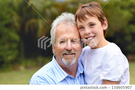 Family, portrait and man or boy with smile for bonding, love and care in backyard, park or nature. Senior, person and child together with embrace, relationship or happiness at home, apartment or joy Family, portrait and man or boy with smile for bonding, love and care in backyard, park or nature. Senior, person and child together with embrace, relationship or happiness at home, apartment or joy 138605907