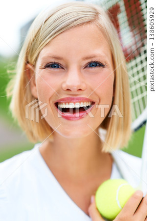 Smile, portrait or happy woman with a ball in tennis training match, fitness exercise or game outdoors. Racket, healthy start or face of girl athlete on court ready for sports, wellness or workout Smile, portrait or happy woman with a ball in tennis training match, fitness exercise or game outdoors. Racket, healthy start or face of girl athlete on court ready for sports, wellness or workout 138605929