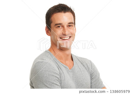 Portrait, smile and a confident man in studio isolated on a white background for fashion or style. Happy, wellness and satisfaction with a young model looking relaxed in a casual clothes outfit Portrait, smile and a confident man in studio isolated on a white background for fashion or style. Happy, wellness and satisfaction with a young model looking relaxed in a casual clothes outfit 138605979