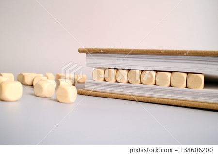 Glossary word written on a wooden block in a book Glossary word written on a wooden block in a book 138606200