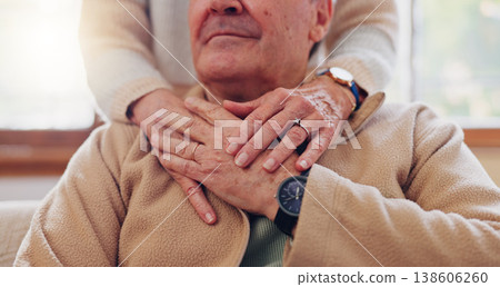 Hands, empathy and a senior couple closeup in their home for love, support or trust during retirement. Hope, healing and sympathy with elderly people on a sofa in the living room of their home Hands, empathy and a senior couple closeup in their home for love, support or trust during retirement. Hope, healing and sympathy with elderly people on a sofa in the living room of their home 138606260