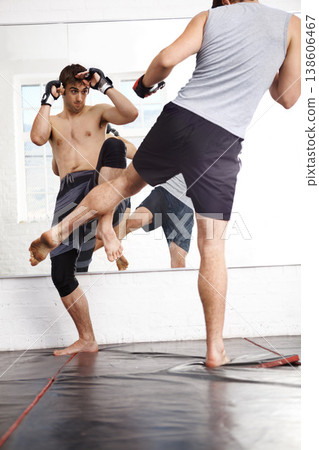 Kickboxing, MMA and men fight in gym, training and fitness with power, strong and martial arts for sport. Exercise, workout and athlete in dojo, competition or contest with boxer, action and muscle Kickboxing, MMA and men fight in gym, training and fitness with power, strong and martial arts for sport. Exercise, workout and athlete in dojo, competition or contest with boxer, action and muscle 138606467
