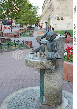 Bronze sculpture of girl boy and fish. Sculpture of Water Wells for Lodz Bronze sculpture of girl boy and fish. Sculpture of Water Wells for Lodz 138608678