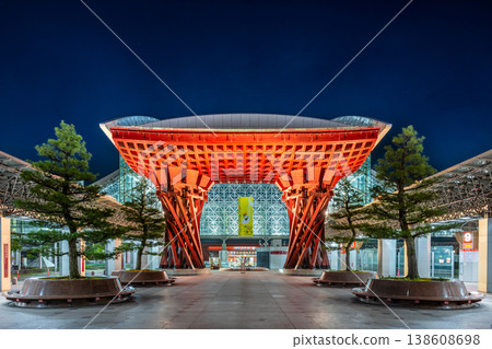 Kanazawa Station's iconic Tsuzumi Gate and Hospitality Dome illuminated at night. Kanazawa Station's iconic Tsuzumi Gate and Hospitality Dome illuminated at night. 138608698