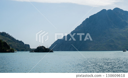 Panoramic Landscape view on green canyon Antalya Turkey with turquoise water mountain cliffs and green forest. Showcasing natural beauty travel tourist destination. Vacation concept 138609618