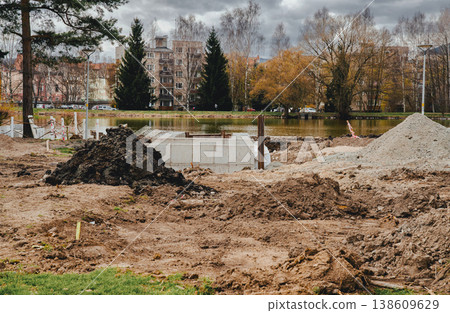 Renovation work on the reservoir in Kamienna Gora, Lower Silesia. Cleaning the reservoir and preparing the beach for swimming. Renovation work on the reservoir in Kamienna Gora, Lower Silesia. Cleaning the reservoir and preparing the beach for swimming. 138609629