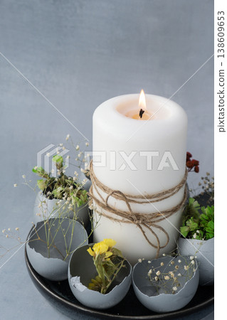 Self made egg shell with candle handmade decoration for Easter holiday. Copy space greeting card present gift ideas. Creative reuse zero waste sustainable living eco-friendly me made decor 138609653