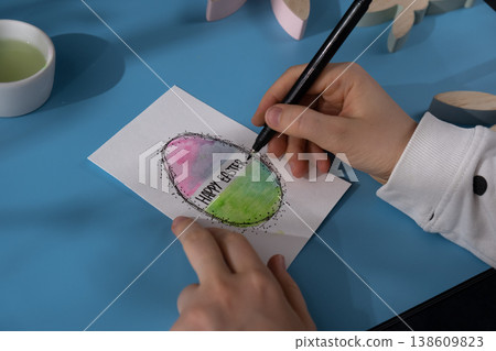Drawing Easter eggs Storytelling of creating craft Easter greeting card holiday present. Tactile hand-on activity. Master class progress of creative me-made gifts. Seasonal domestic life micro moment Drawing Easter eggs Storytelling of creating craft Easter greeting card holiday present. Tactile hand-on activity. Master class progress of creative me-made gifts. Seasonal domestic life micro moment 138609823