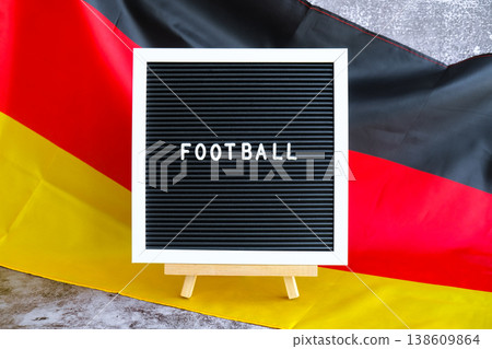 Lightbox with text STUDY IN GERMAN National symbol of Germany. German wave silky flag background. Education and learning Lightbox with text STUDY IN GERMAN National symbol of Germany. German wave silky flag background. Education and learning 138609864