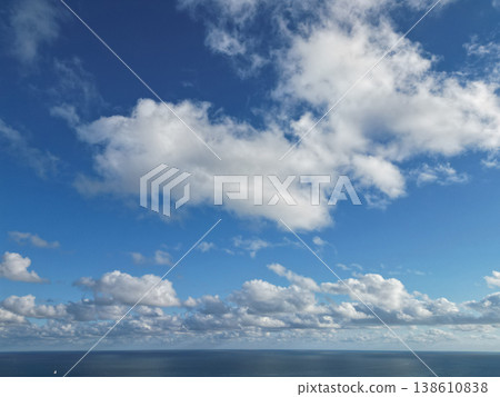 Sea horizon view. Cloudy sky and seascape at summer vacation. Skyscape with sea horizon. Calm horizon view at sea nature. Romantic summer vacation view on seascape Sea horizon view. Cloudy sky and seascape at summer vacation. Skyscape with sea horizon. Calm horizon view at sea nature. Romantic summer vacation view on seascape 138610838