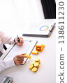 Gold Trading Businessman invest in trading gold, calculating profit price of buy and sell gold. 138611230