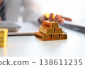 Gold Trading Businessman invest in trading gold, calculating profit price of buy and sell gold. 138611235