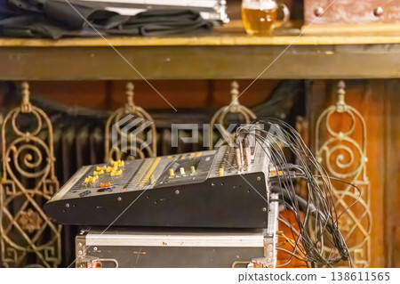 Audio mixer soundboard with cables at a pub Audio mixer soundboard with cables at a pub 138611565