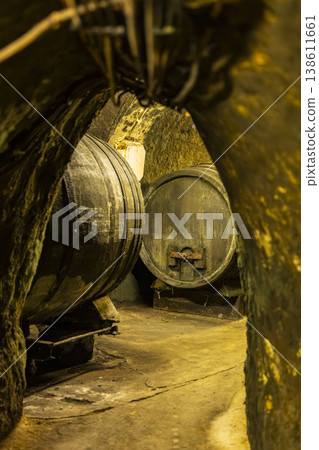 Barrels storing wine in an ancient Znojmo cellar Barrels storing wine in an ancient Znojmo cellar 138611661