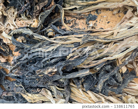 Dried meigan cai leaves pile in natural, earthy tones 138611765