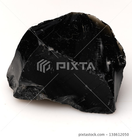 Large Polished Black Obsidian Volcanic Glass Rock with Sharp Conchoidal Fractures and Glossy Reflective Texture. 138612050