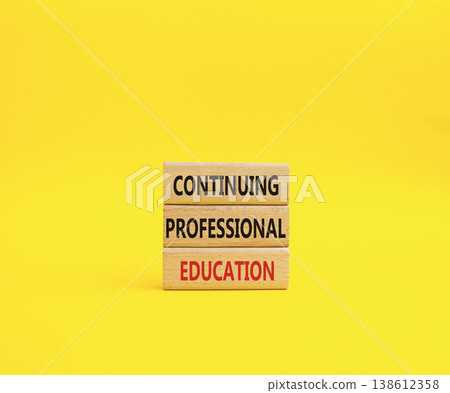 Continuing Education symbol. Concept words Continuing Professional Education on wooden blocks. Beautiful bright yellow background. Business and Education concept. Copy space Continuing Education symbol. Concept words Continuing Professional Education on wooden blocks. Beautiful bright yellow background. Business and Education concept. Copy space 138612358