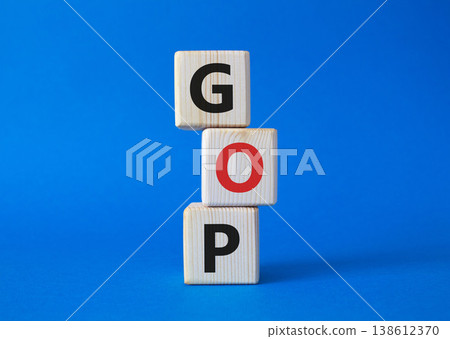 GOP - Gross Operating Profit symbol. Concept word GOP on wooden cubes. Beautiful blue background. Business and GOP concept. Copy space. GOP - Gross Operating Profit symbol. Concept word GOP on wooden cubes. Beautiful blue background. Business and GOP concept. Copy space. 138612370