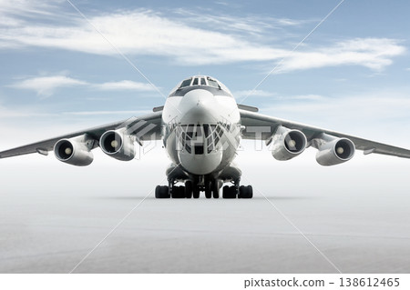 Front view of the big wide body transport freight airplane on bright background with sky Front view of the big wide body transport freight airplane on bright background with sky 138612465
