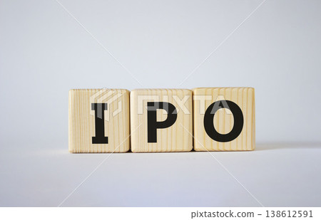 IPO- Initial Public Offering symbol. Concept word IPO on wooden cubes. Beautiful white background. Business and IPO concept. Copy space. IPO- Initial Public Offering symbol. Concept word IPO on wooden cubes. Beautiful white background. Business and IPO concept. Copy space. 138612591