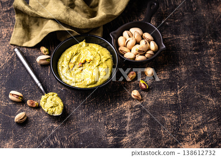 Sweet pistachio cream in a bowl Sweet pistachio cream in a bowl 138612732