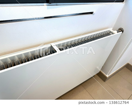 Modern Heating Radiator Close Up Indoors, Home Temperature Control and Energy Efficiency Concept Modern Heating Radiator Close Up Indoors, Home Temperature Control and Energy Efficiency Concept 138612764
