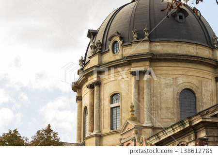 large building cathedral dome church European architecture with a dark dome roof and ornate details under a cloudy sky large building cathedral dome church European architecture with a dark dome roof and ornate details under a cloudy sky 138612785
