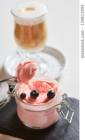 Luxury pink berry mousse served in an artisanal glass jar with fresh blueberries Luxury pink berry mousse served in an artisanal glass jar with fresh blueberries 138613093