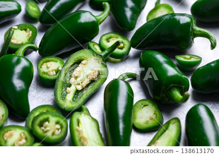 Jalapeno peppers mix of whole and cut pieces Jalapeno peppers mix of whole and cut pieces 138613170