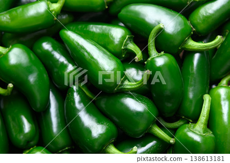 Pile of fresh jalapeno peppers filling frame Pile of fresh jalapeno peppers filling frame 138613181