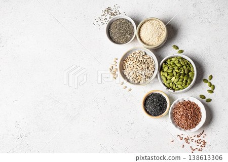 Assortment of seeds in bowls for healthy eating Assortment of seeds in bowls for healthy eating 138613306
