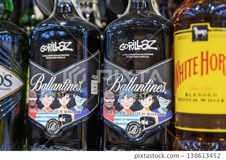 Limited edition Ballantine's Finest x Gorillaz whiskey bottles on shelf 138613452