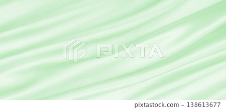 Smooth elegant green silk or satin luxury cloth texture as abstract background. Luxurious background design 138613677