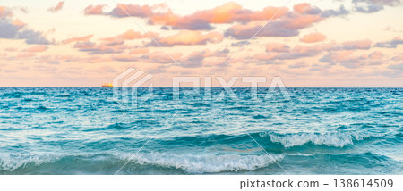 Sea sunset on ocean. Sunset seascape at summer vacation. Sunrise with sea beach. Dramatic sunrise horizon at sea. Romantic summer vacation on sunset seascape. Sea breeze 138614509