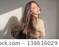 A woman with long, colored hair. 138616029