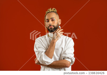 Make up artist Black latin gay man isolated on red Make up artist Black latin gay man isolated on red 138616426