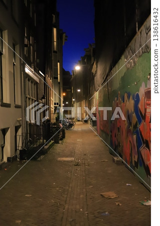 Street art painted on the alley at night and quiet streetlights Street art painted on the alley at night and quiet streetlights 138616432