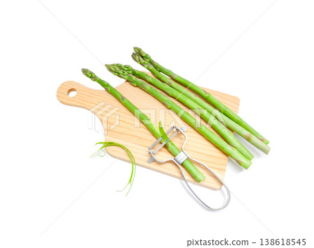 Image of peeling asparagus with an eyelash curler [White background, cutout] 138618545