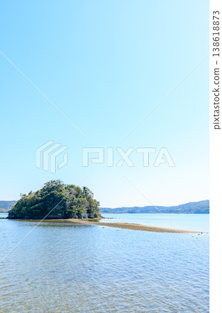 Kojima Shrine at low tide in spring, Iki City, Nagasaki Prefecture Kojima Shrine at low tide in spring, Iki City, Nagasaki Prefecture 138618873