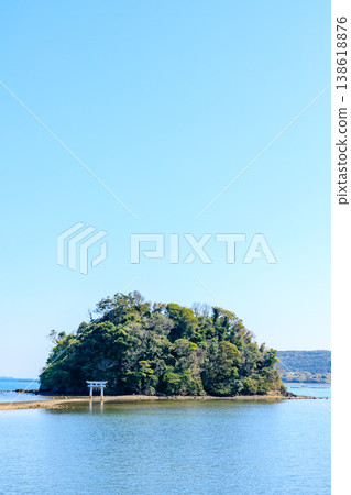 Kojima Shrine at low tide in spring, Iki City, Nagasaki Prefecture Kojima Shrine at low tide in spring, Iki City, Nagasaki Prefecture 138618876