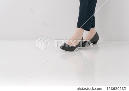 Legs of a woman in a suit 138620285