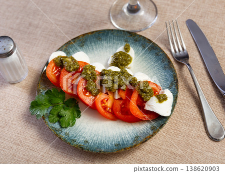 Caprese salad with pesto sauce and cilantro Caprese salad with pesto sauce and cilantro 138620903