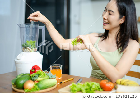 Healthy meal planning concept of woman preparing fresh food at home. Clean eating, nutrition, food diary, wellness lifestyle and balanced diet Healthy meal planning concept of woman preparing fresh food at home. Clean eating, nutrition, food diary, wellness lifestyle and balanced diet 138621129