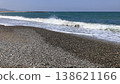 Waves crashing onto a rocky shore (3) 138621166