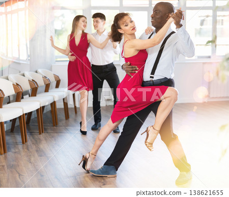 Adult man and adult woman dance tango 138621655