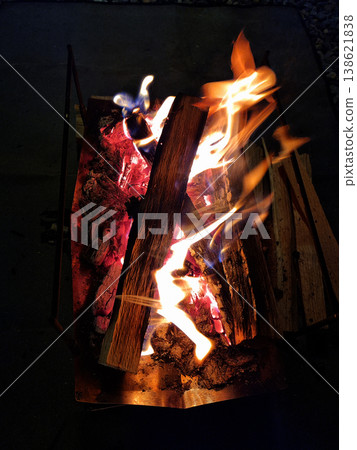 It is a flame rising from a bonfire. It is a flame rising from a bonfire. 138621838